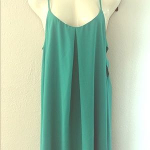 Teal dress with peek a boo sides